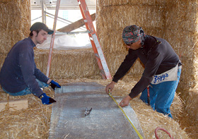 Habitat work on straw house